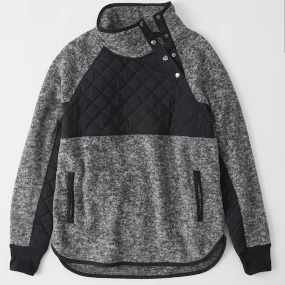 Asymmetrical Snap Up Fleece.